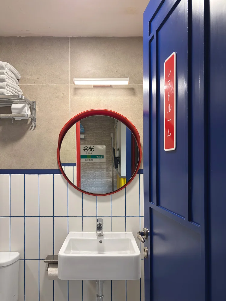 Shibuya: Soap and shampoo are stocked in the bathroom, the same in every unit.