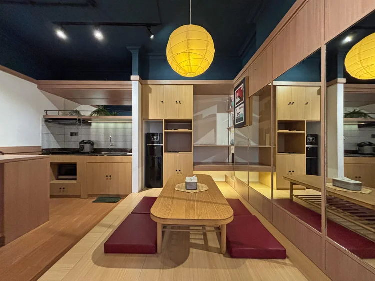 Kyoto: The open kitchen flows into a floor-seating area, a design touch unique to Kyoto.