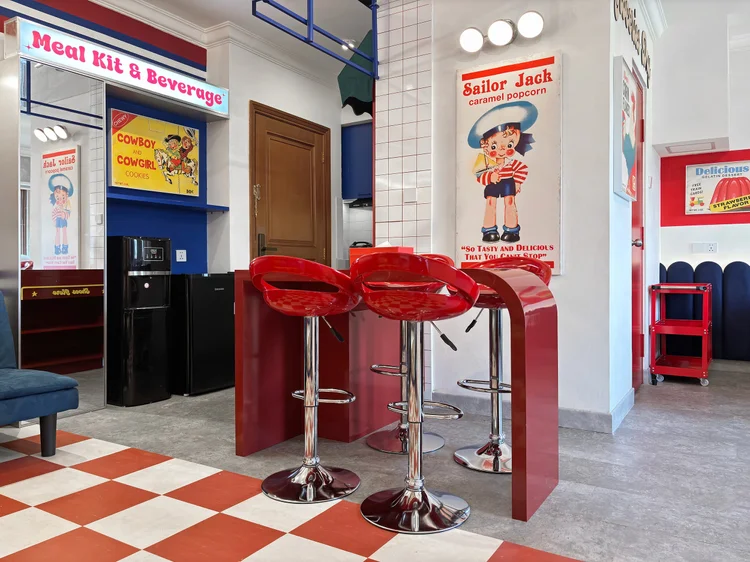 Miami: A bar table for four, with the fridge and water dispenser alongside.