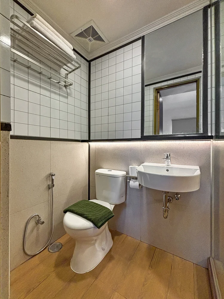 Yokohama: Bathroom with toilet and basin; the same soap and shampoo in every unit.