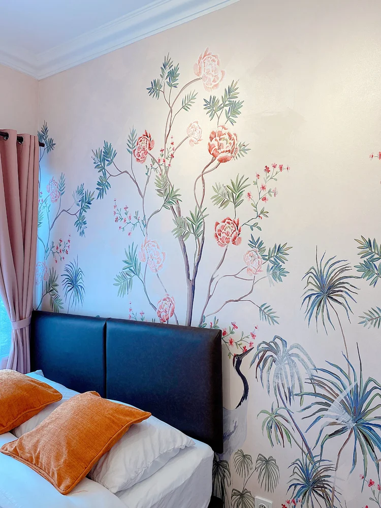 Malacca: Walls of flowers and birds, the signature of a Peranakan-style bedroom.