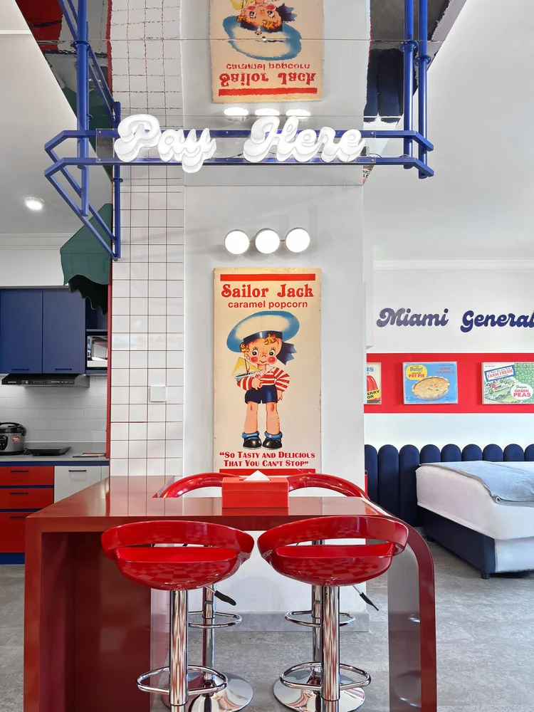 Miami: The Pay Here sign and old posters, details of the grocery theme.