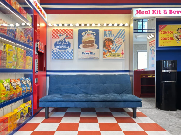 Miami: The blue sofa bed in front of the shelves, already counted in the five it sleeps.