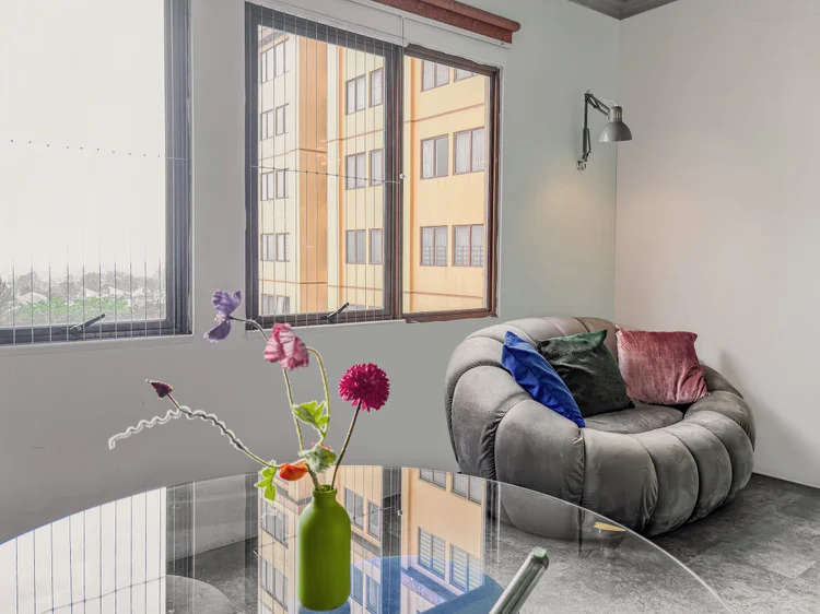 Vancouver: The two-seater sofa beside the wide window.