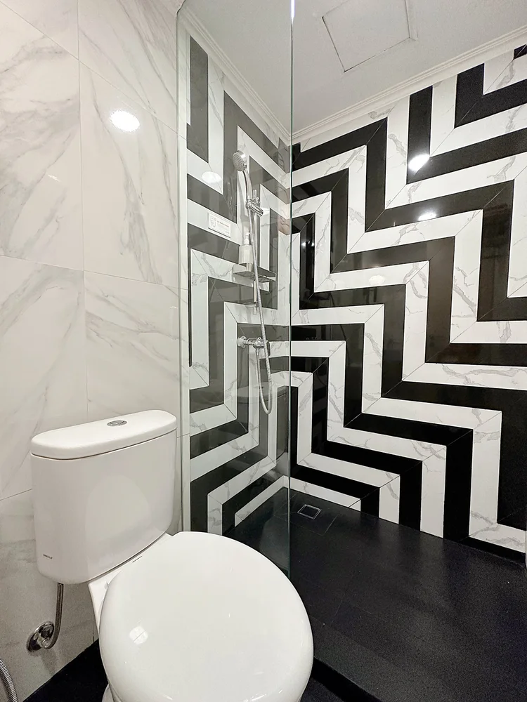 New York: A black-and-white tiled bathroom, cleaned to CHSE standard before every check-in.