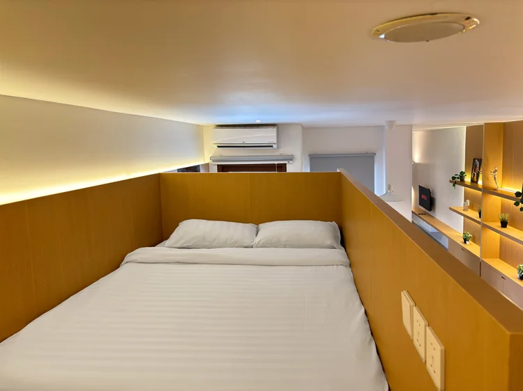 Helsinki: The two loft beds push together into one, with their own AC.