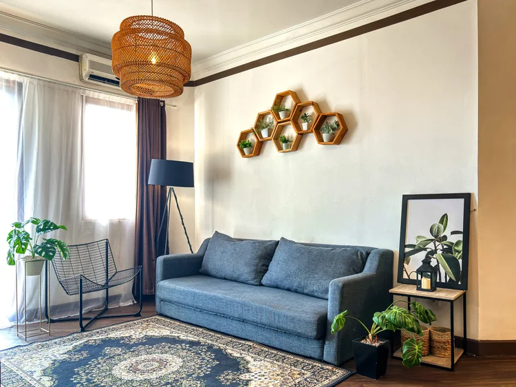 Norfolk: The blue three-seater sofa that opens into a bed, already counted in the eight it sleeps.