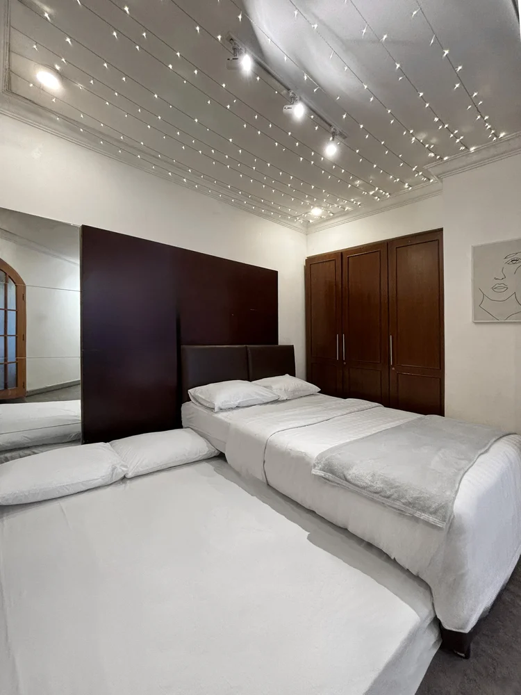 Ubud: Master bedroom: the bed pulled out fully. Sleeps 7, up to 9 with extra beds across the unit.