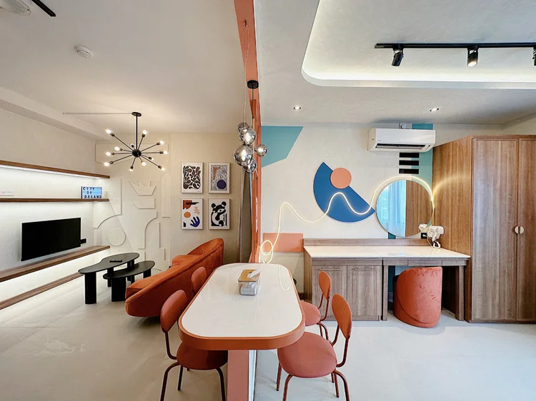 New York: A dining table for four, next to the dressing table and sleeping area.