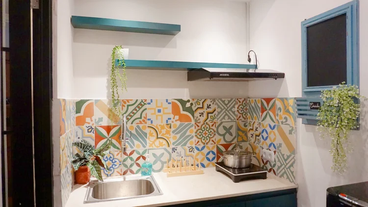 Havana: Open kitchen with patterned tiles; the lobby convenience store sells the basics for cooking.