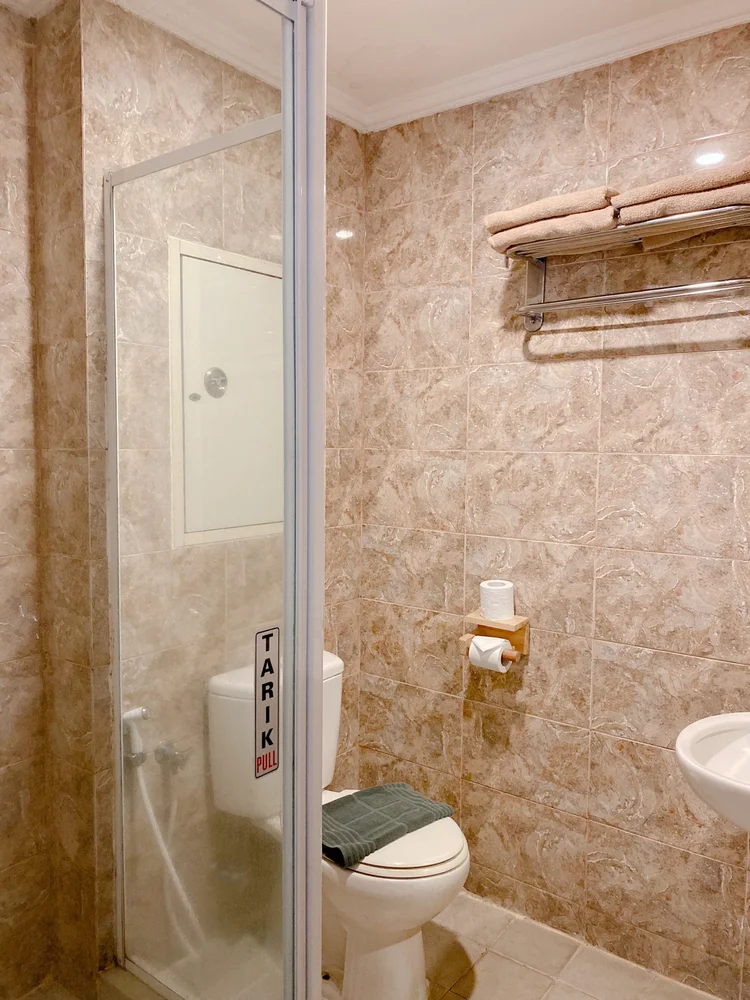 Oslo: Hot-water shower, in one of the unit's two bathrooms.