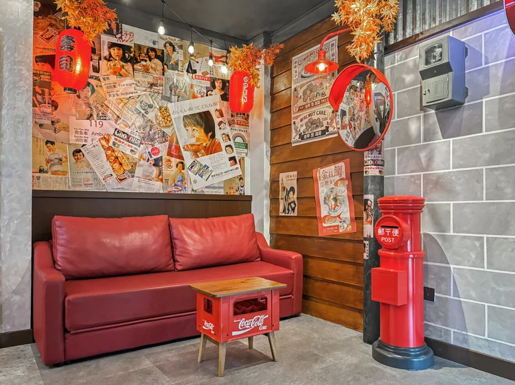 Shinjuku: This red sofa bed opens out, already counted in the five it sleeps.