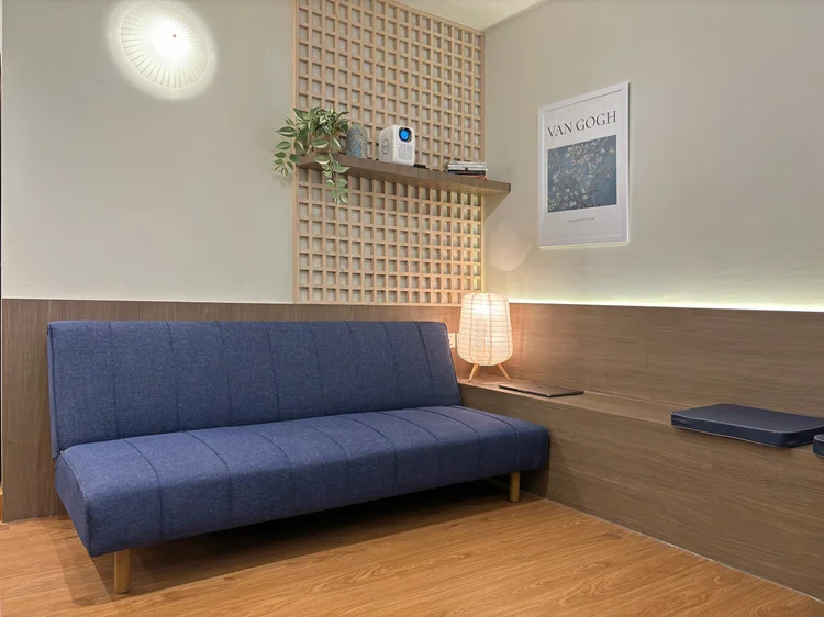 Aoyama: Sofa bed and a long bench facing the screen; the sofa is already counted in the 5 it sleeps.