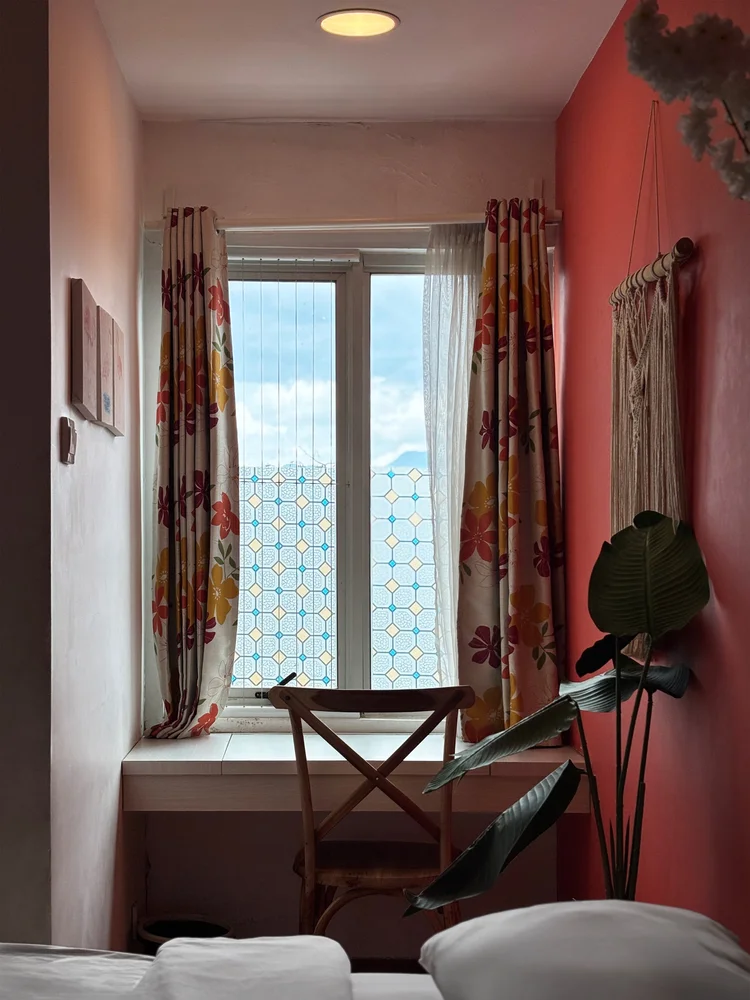Honolulu: A window corner in the master bedroom with a chair, for a quiet morning sit.