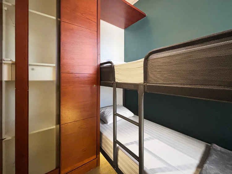 Chicago: The bunk bed with curtains and AC, in a separate bedroom for two.