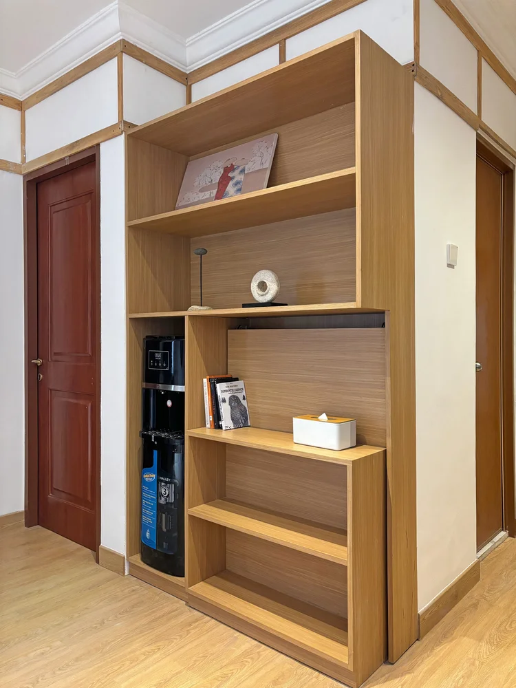 Hokkaido: Open shelving with the water dispenser; every unit keeps a spare gallon.
