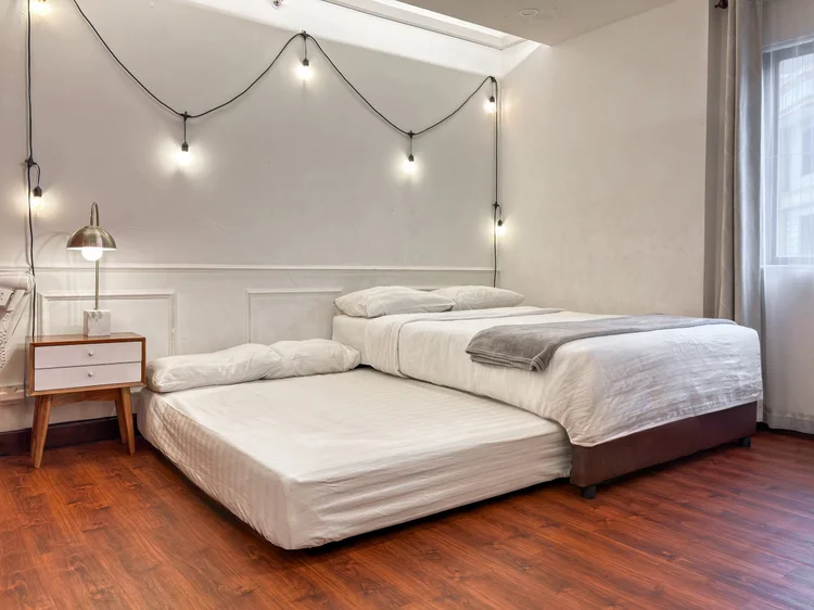 Provence: A sliding bed: the lower half pulls out as a second small double bed.