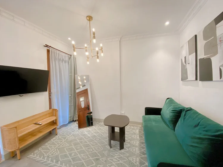 Budapest: The green sofa folds out into a bed, already part of the base capacity.