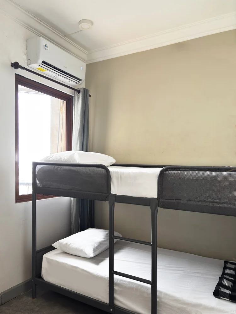 Ubud: Soft pillows on the bunk bed, with the AC facing straight at the bed.