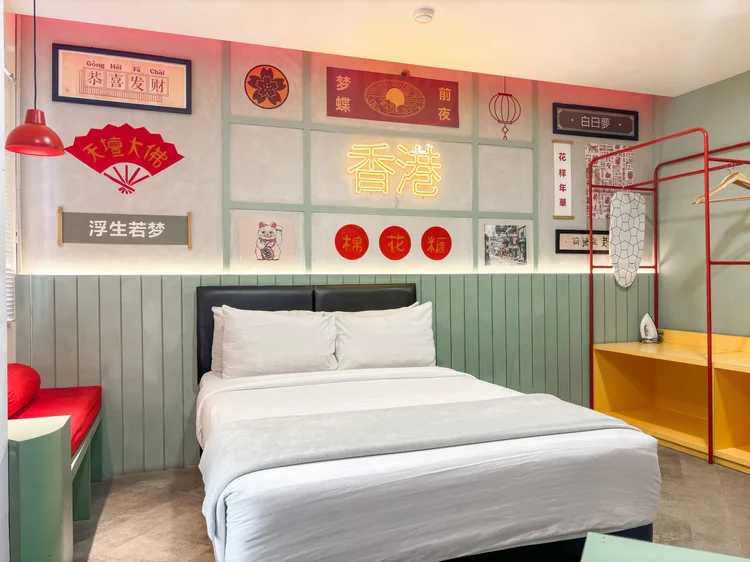 Hong Kong: A 140 cm small double bed with an open wardrobe beside it.