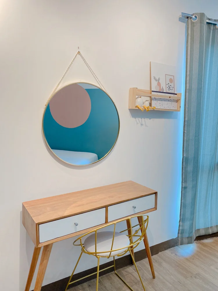 Madison: A dressing table with mirror in the bedroom, somewhere to get ready before heading out.