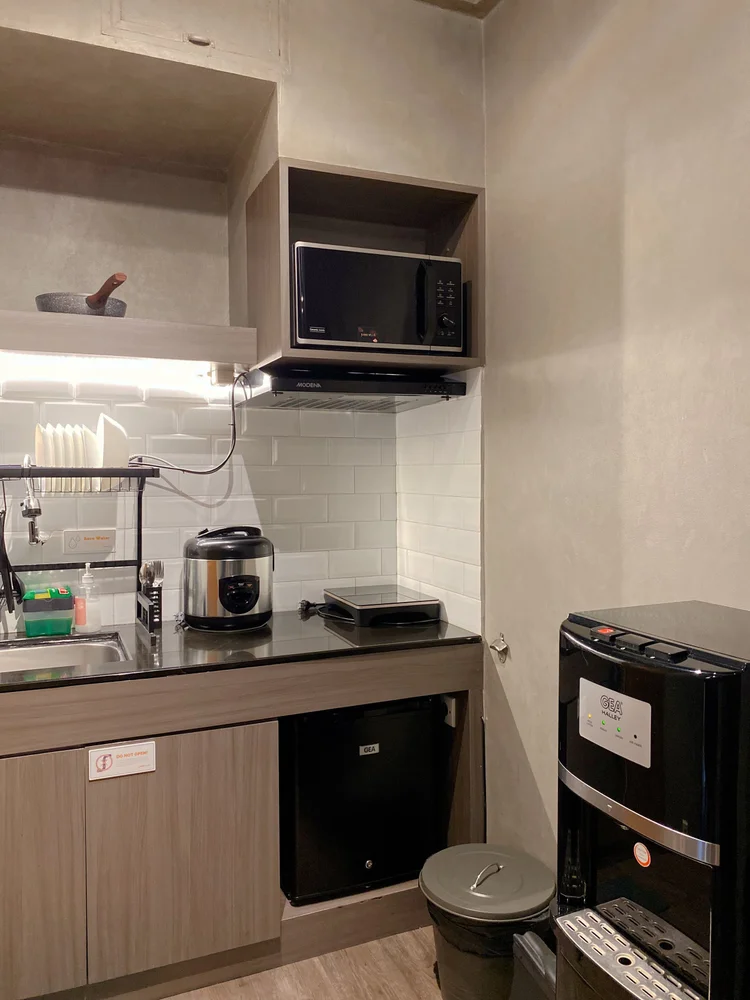 Kingston: The water dispenser in the kitchen; every unit keeps a spare gallon.