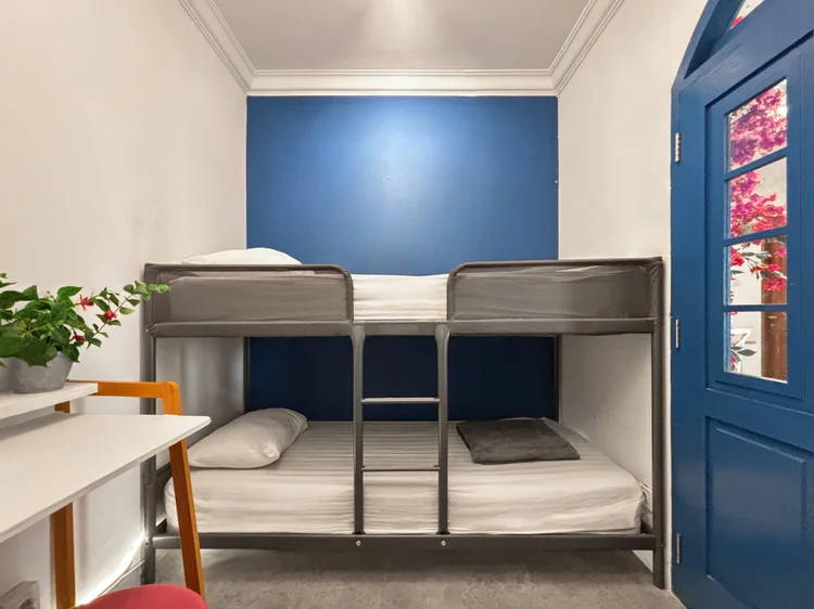 Santorini: A bunk bed for two, with its own AC and a small ensuite bathroom.