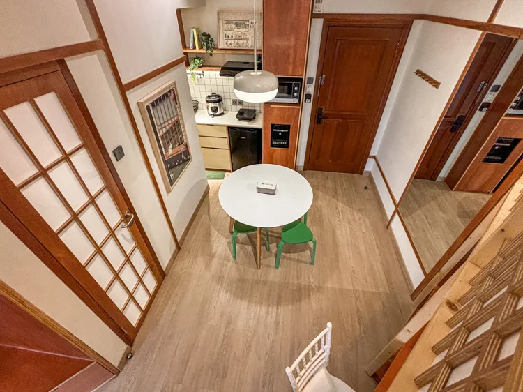 Kanazawa: Seen from the loft: dining table, kitchen and shoji doors below.