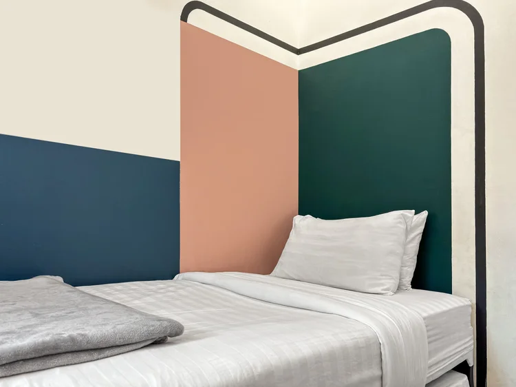 Geneva: Second bedroom: sliding single beds that push together, with their own AC.