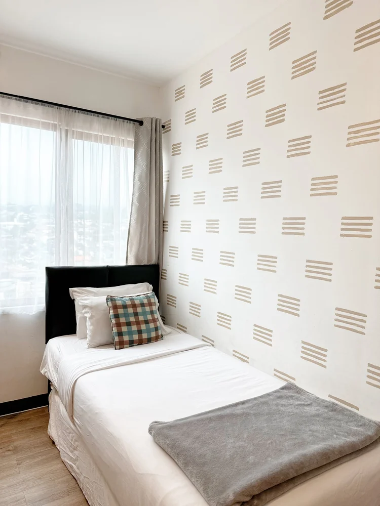 Positano: Another bedroom with a 90 + 90 cm sliding single bed and AC.
