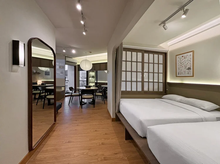 Aoyama: Full-length mirror in the hallway, with the bed nook and dining table in one view.
