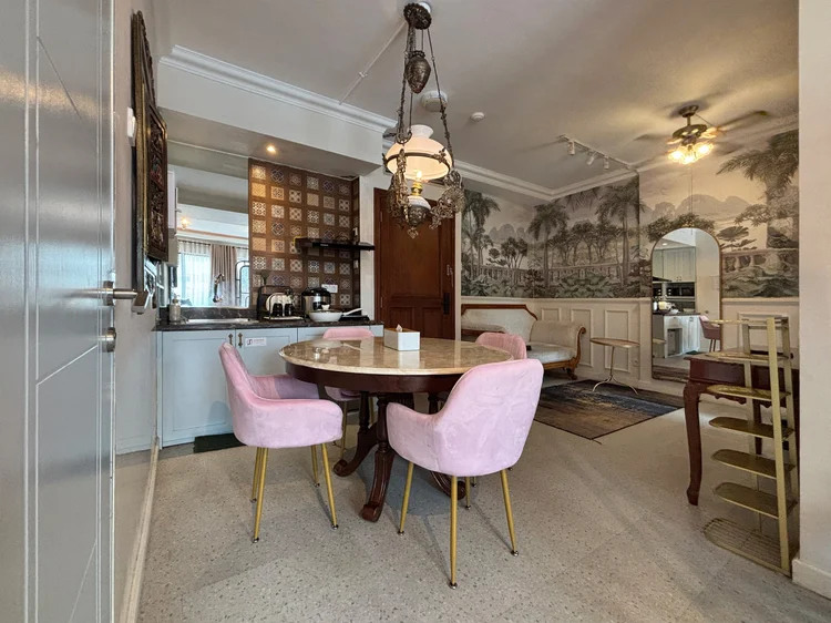 Batavia: Dining table for four, in a studio with an Indo Dutch feel.