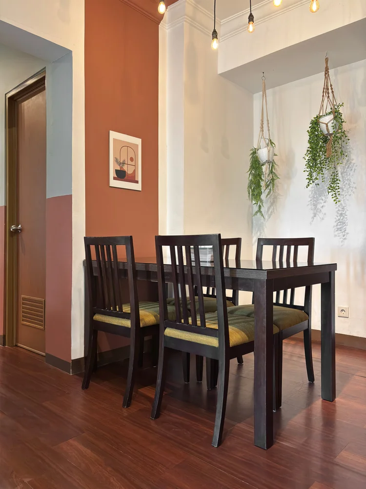 Namibia: Dining table with wooden chairs, for meals together without going out.
