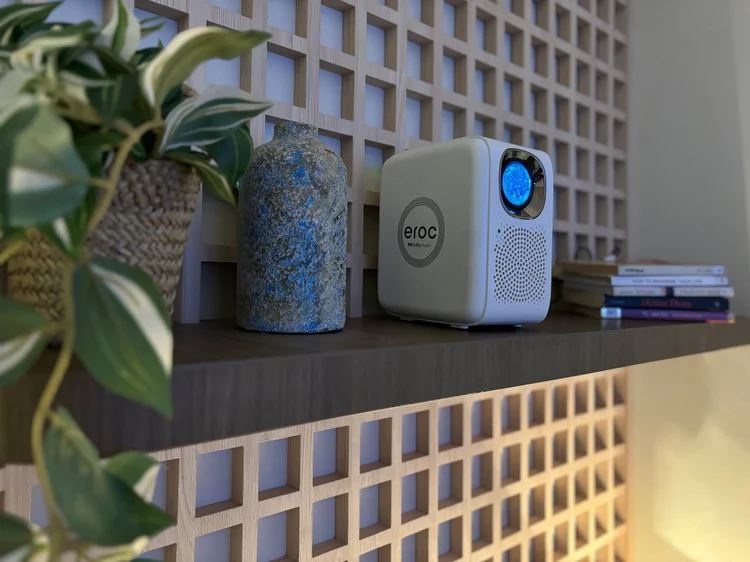 Aoyama: The projector sits small on a shelf; switch it on and pick a film.