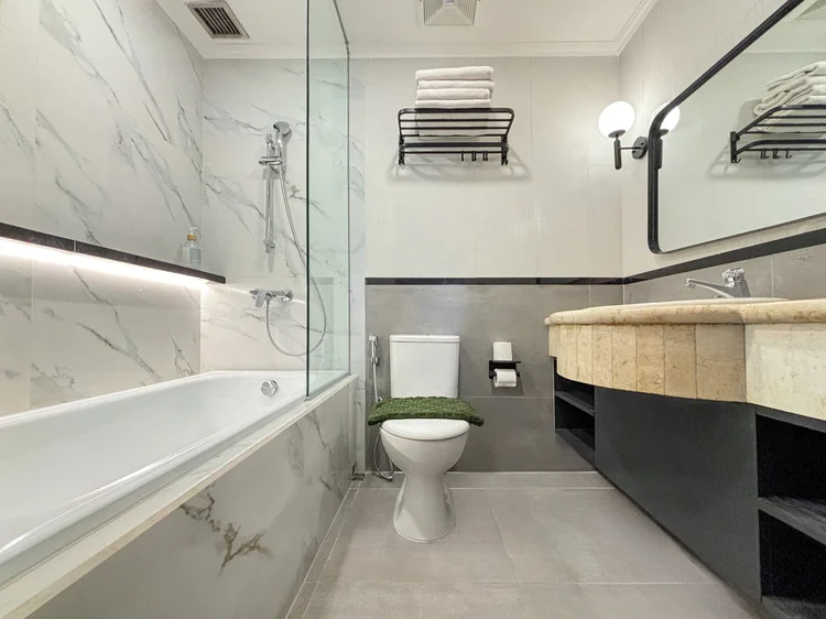 Norfolk: The master bedroom's ensuite, with a hot-water bathtub.
