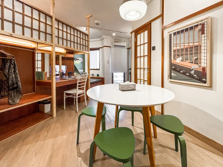 Kanazawa: A dressing table that doubles as a desk, with the wardrobe next to it.