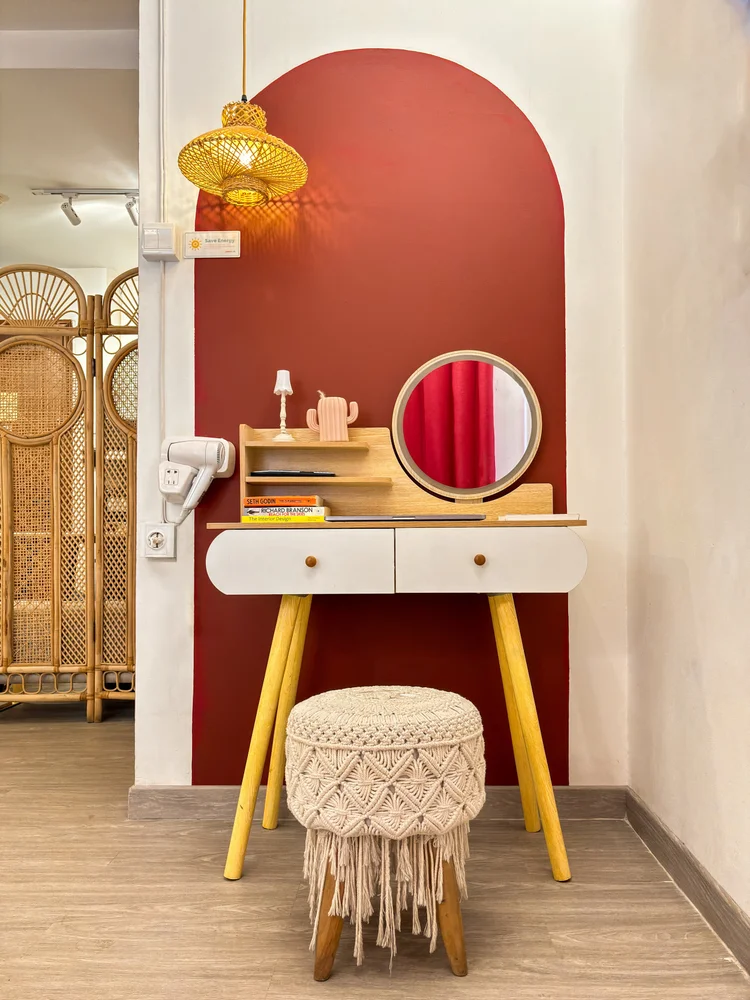Ankara: The dressing table behind a rattan screen, for getting ready before heading out.