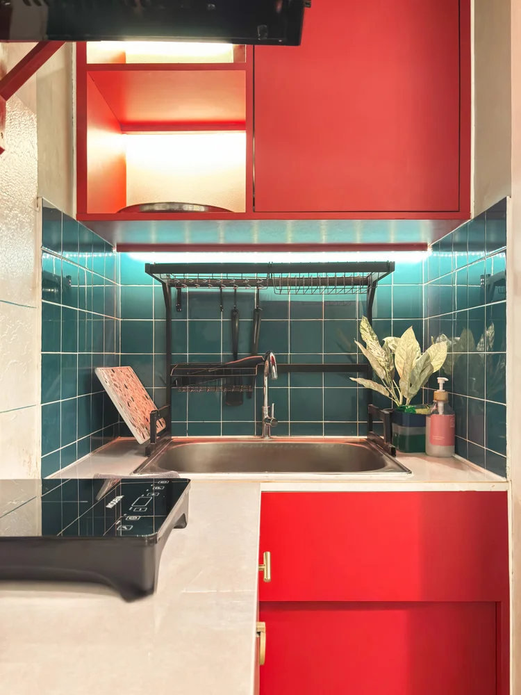 Hong Kong: The sink and red cabinets; basic cooking tools are already there.
