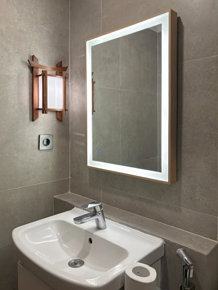 Fukuoka: Washbasin with a lit mirror; soap and shampoo the same in every unit.