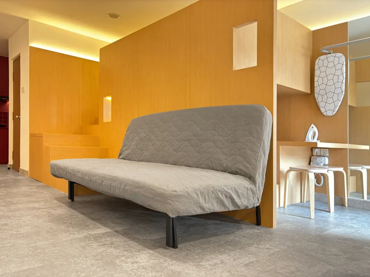 Helsinki: The wood loft-bed structure with the sofa underneath, a space-saving Nordic design.