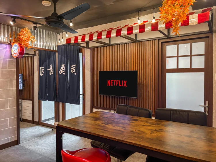Shinjuku: A bar table for four, like a tiny eatery in a Shinjuku alley.