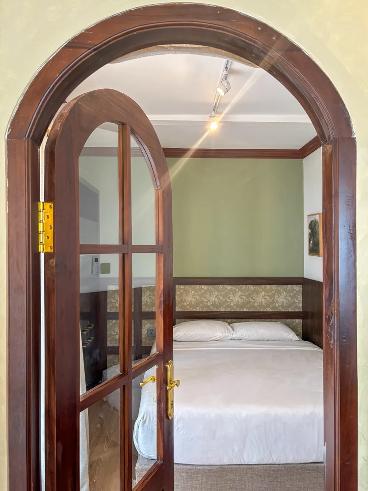 Kensington: Arched wooden doors are a Kensington signature, leading into each bedroom.