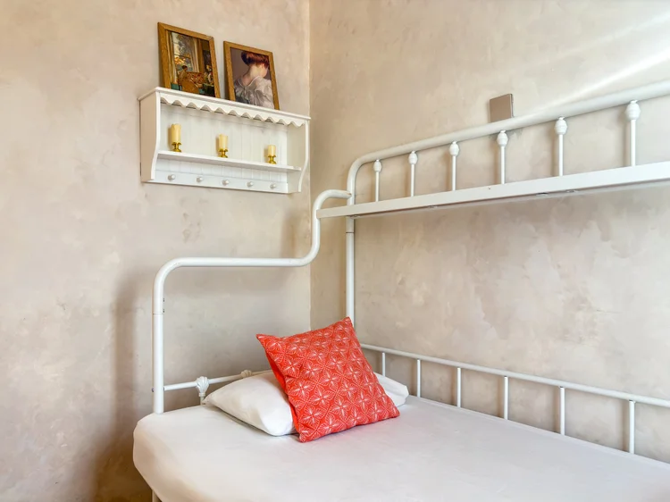 Bordeaux: White iron day bed, made up fresh before you arrive.
