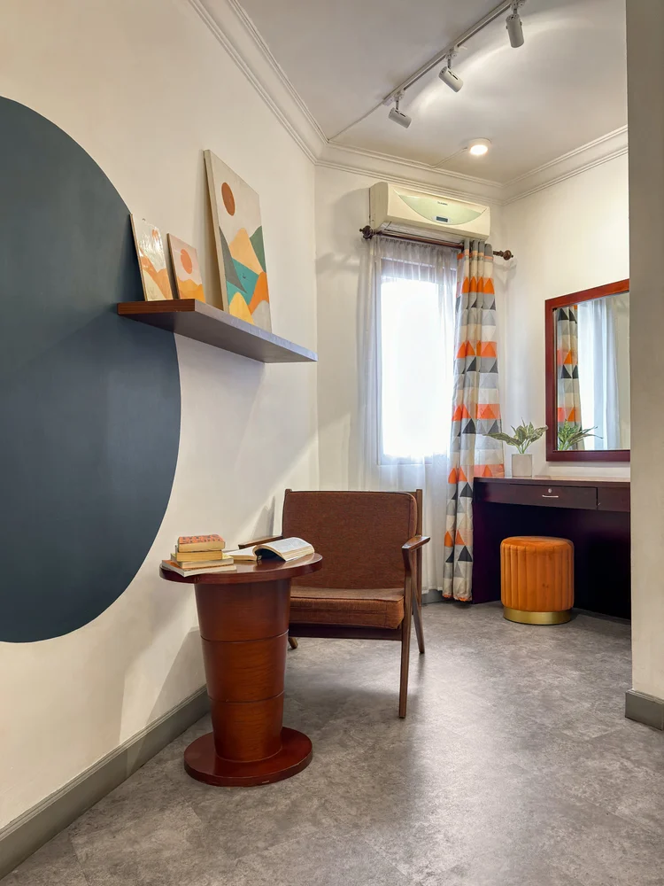Chicago: A reading corner with a chair and small table, beside the master bedroom.