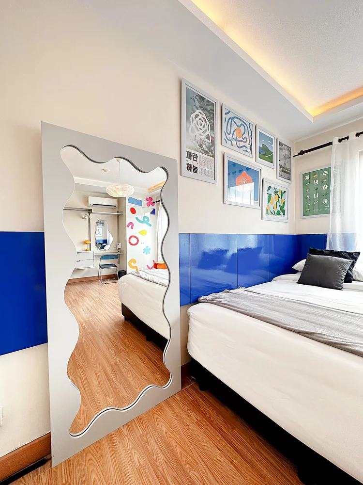 Jeju: A full body mirror in the room, handy for a last look before heading out.