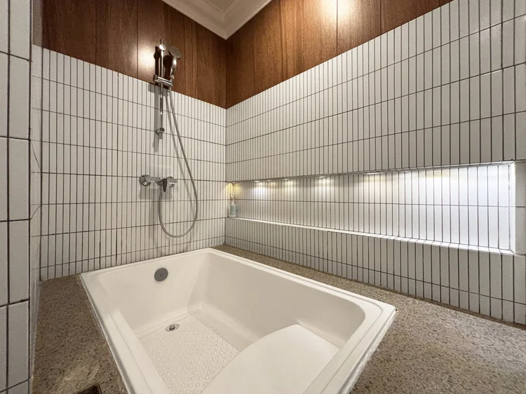 Kyoto: The master bathroom has a bathtub, for a relaxed soak after a day out.