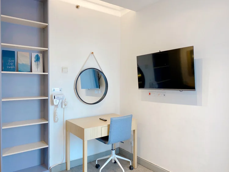 Austin: Dressing table with a round mirror and chair, works for a laptop too.
