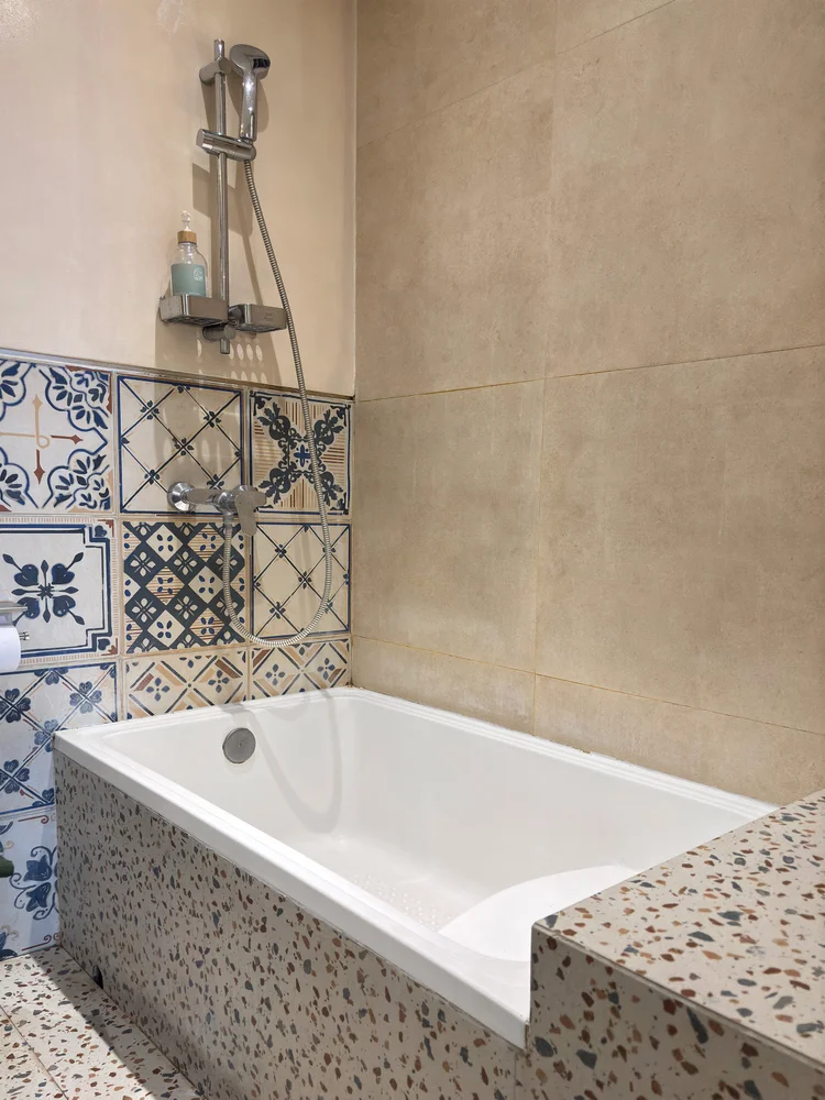 Santorini: A bathtub with hot water, for a soak after a day around Bandung.