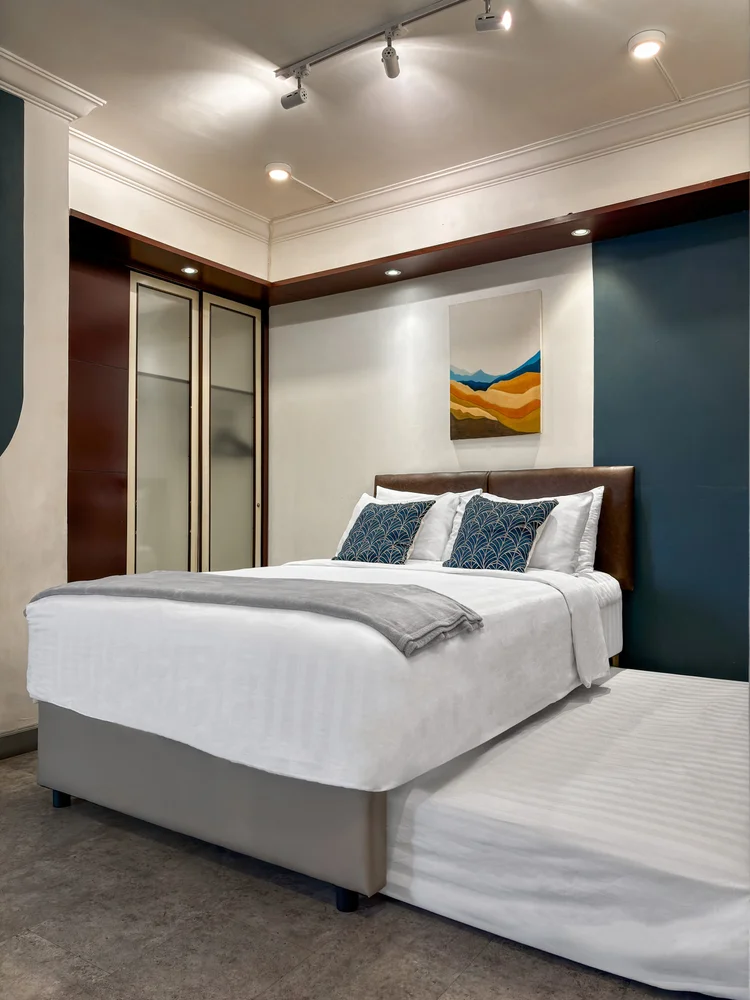 Chicago: Master bedroom: sliding small double beds with their own AC and wardrobe.