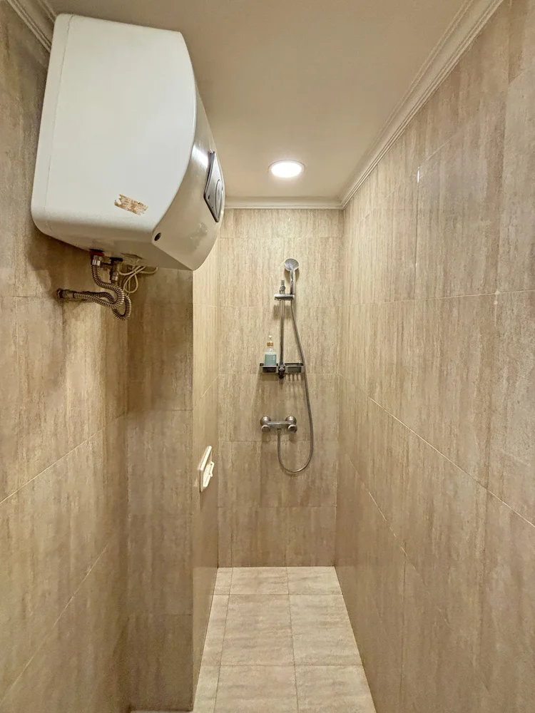 Montreal: A shower with a water heater, so a warm shower is always there.